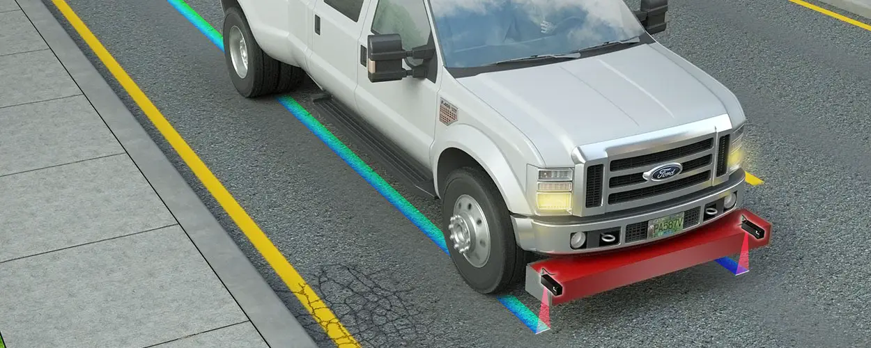 Bumper-mounted laser profiler with two wheel-path sensors